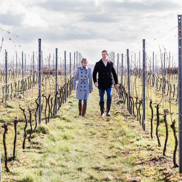 Susie Barrie MW and Peter Richards MW in the Hattingley Valley vineyard, photo by Cath Lowe photography
