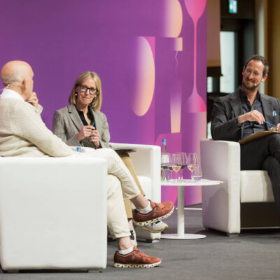 Susie and Peter interview John Malkovich at the IMW Symposium 2023, credit: Arne Landwehr